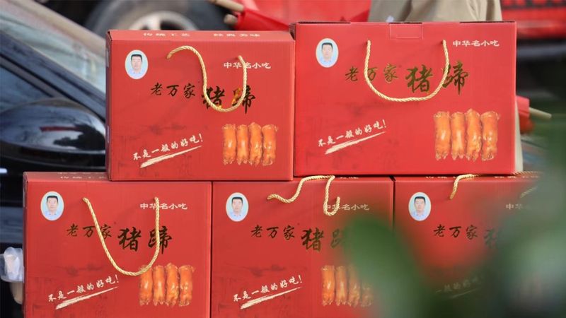 二维彩虹客户案例：老万家猪蹄如何在线下使用社交媒体二维码？